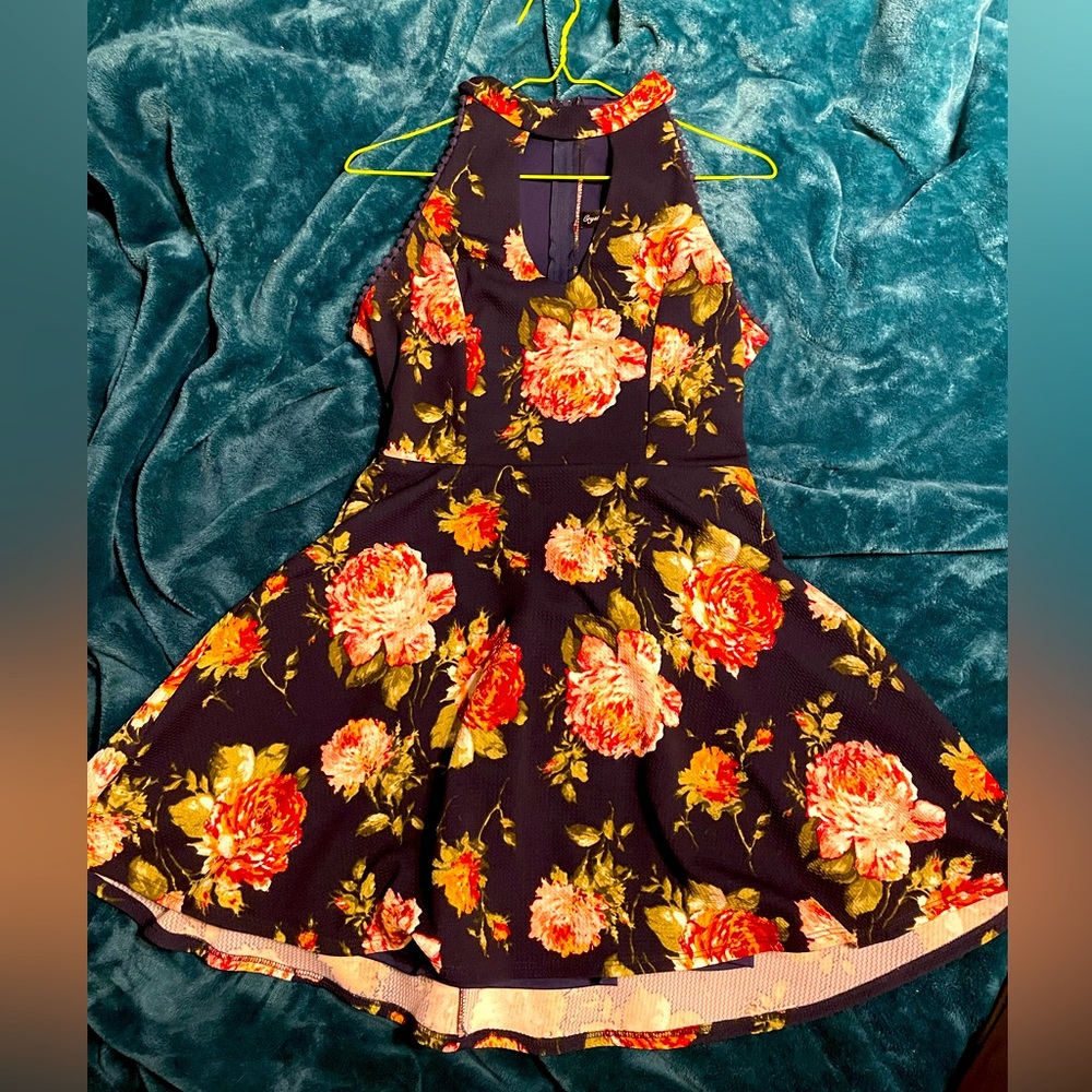 Size us 11 Crystal Doll dress navy with pinkk floral designs on it